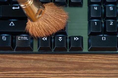 Brush cleans the keyboard Stock Photos