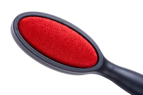 Brush for clothes macro Stock Photos