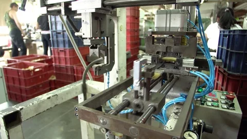 Brush conveyor in a small factory close-up 4k. Stock Footage