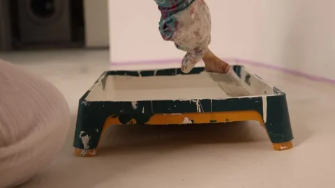 Brush Dipping Into Paint Tray Close Up Stock Footage 345780199