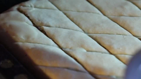 Brush the dough with egg 1 Video stock 320832960