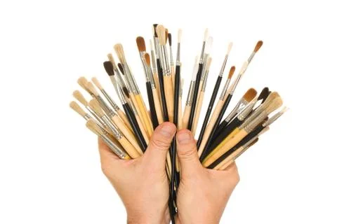 Brush to draw in hand Stock Photos