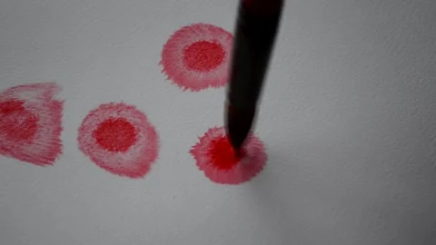 Brush with drops of red paint and stains on white paper Video stock 167635187