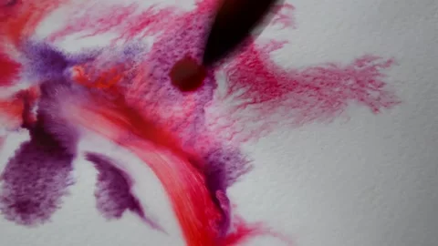 Brush with drops of red paint and stains on white paper Video stock 167730469