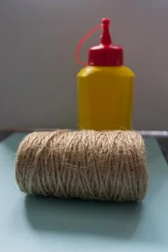 Brush, glue, twine composition Stock Photos
