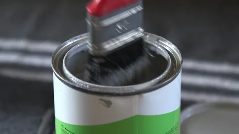 Brush in grey paint can Stock Footage 137862927