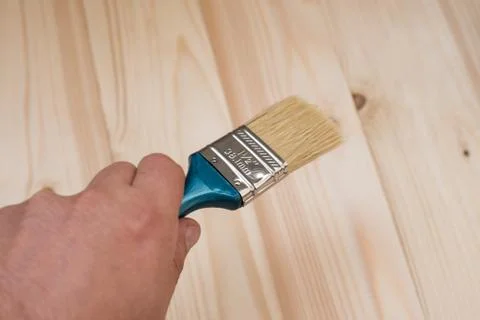 Brush in hand Stock Photos