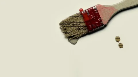 Brush with Newspaner Paint Stock Footage 74249585