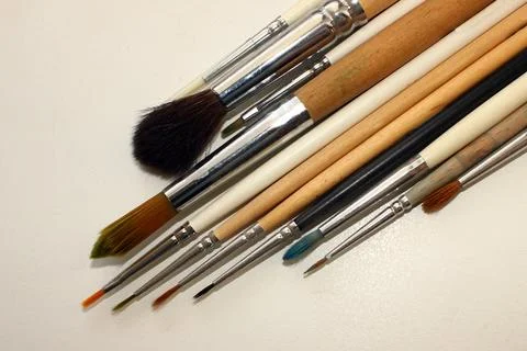 Brush for painting, group of objects on a light background. close-up Stock Photos