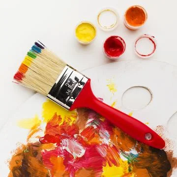 Brush with rainbow paint design Stock Photos