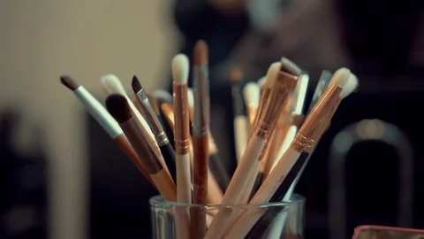 Brush set for make-up on the table, Makeup brush on table Video stock 69976955