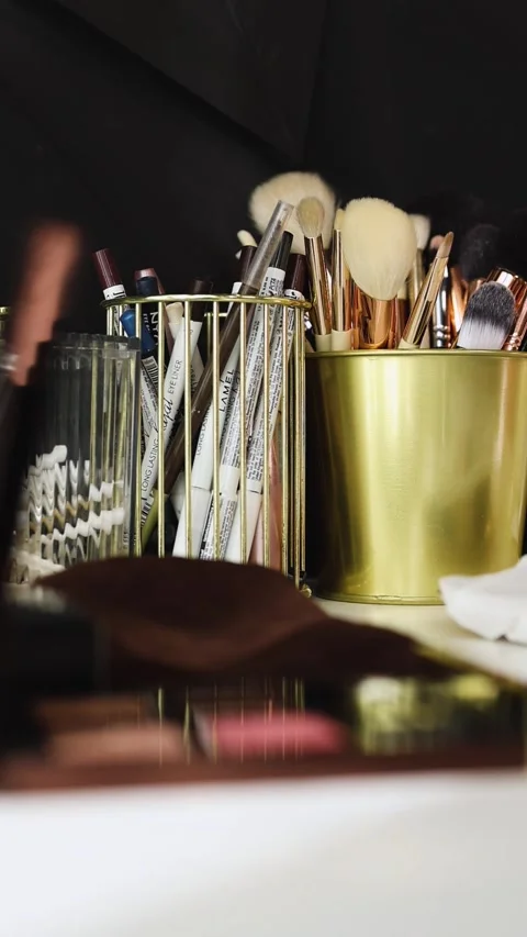 Brush set for make-up on table. Makeup artist tools. Stock Footage 269693233