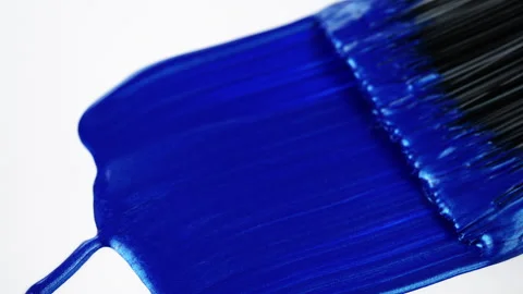 Brush spreading bright blue paint Video stock 255886447