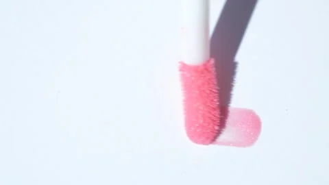 Brush stroke of pink lip gloss on a white background. Stock Footage 279254716