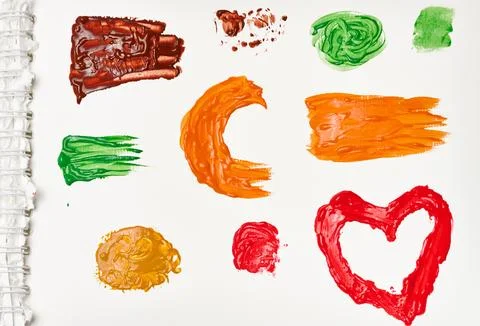 Brush strokes, drops of multi-colored oil paint on a white background 스톡 사진