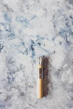 Brush on top of finished work of an abstract textured painting or photography Stock Photos