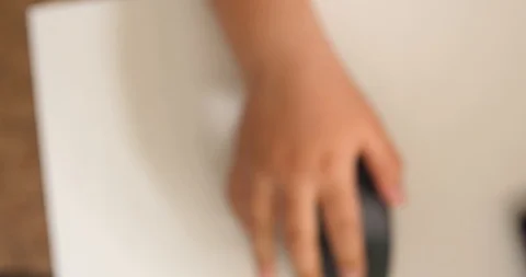 Brush your child's hands on a computer mouse Stock Footage 91401827
