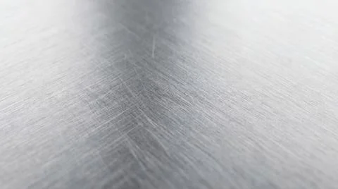 Brushed metal background with fine parallel scratches and subtle light refl.. Stock Illustration