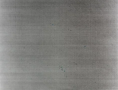 Brushed metal gray background with subtle blue specks for modern industrial Stock Photos