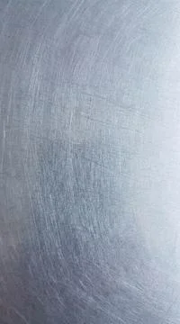 Brushed metal surface texture with fine scratches and reflections detailed .. Illustrazione stock