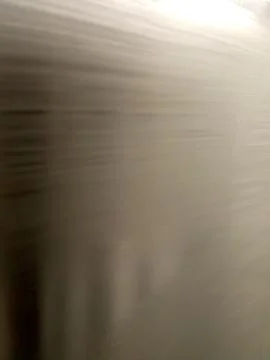 Brushed metal texture background with light reflection for graphic design o.. Stock Photos