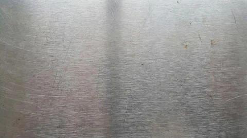Brushed stainless steel surface texture with horizontal grain and scratches.. Stock Illustration