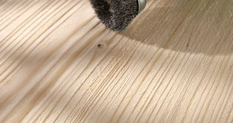 Brushed wood. The surface of aged wood with a metal brush on a drill. Stock Footage 243576701