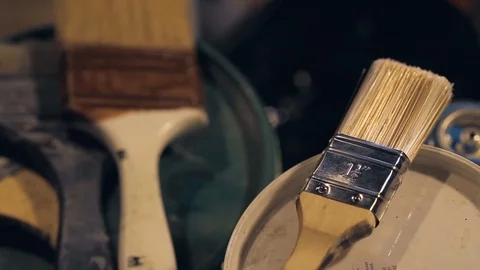 Brushes and Cans with Paint and Jars with Solvent in the Artist's Studio. Video stock 82382737