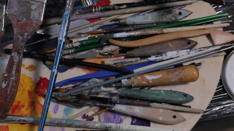 Brushes and paints, creative mess, panorama up Stock Footage 113786143