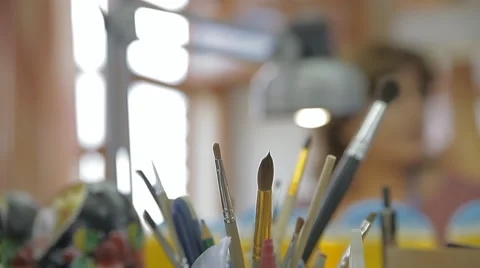 Brushes on an artist's table Stock Footage 66979043