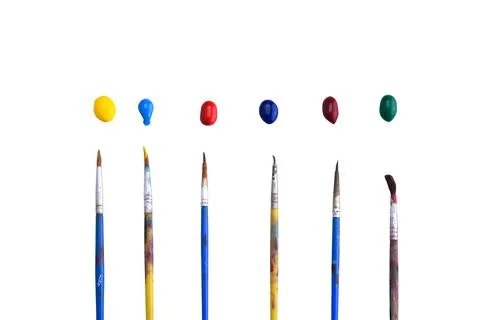 Brushes with colored bright paints on white background. Different colors Stock Photos