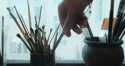 Brushes in the creative studio. Artist's equipment Stock Footage 219806375
