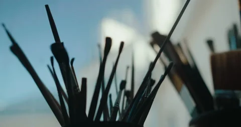 Brushes in the creative studio. Artist's equipment Stock Footage 219806670