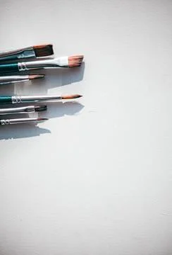 Brushes for drawing on a white background Stock Photos