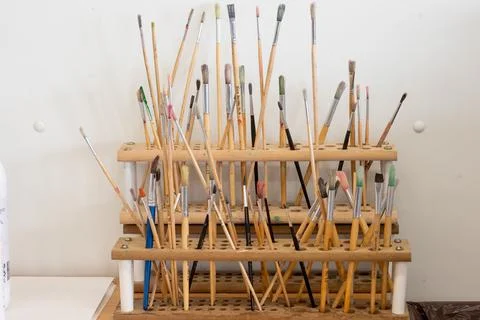 Brushes in holder Stock Photos