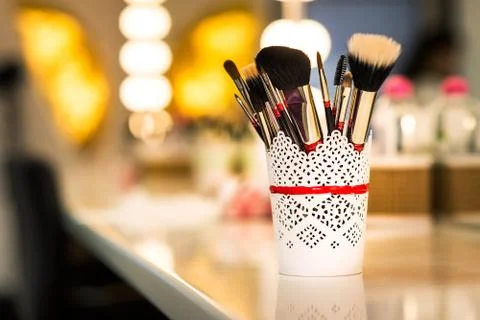 Brushes for make-up on the table Stock Photos