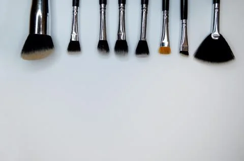 Brushes for makeup lying on white background Foto stock