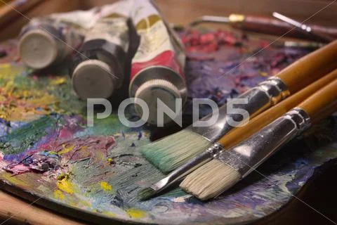 Brushes, paints, pallette Stock Photos