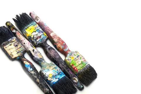 Brushes in paints on a white background Foto stock