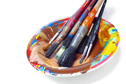 Brushes in a plate Stock Photos