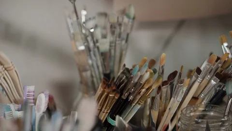 Brushes in the studio of artist Stock Footage 115279284