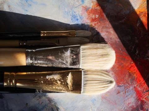 Brushes On A Sunlit Palette Stock-Fotos