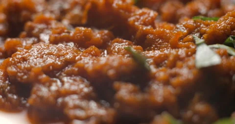 Brushetta tomato preparation rotating with basil pouring slow motion Stock Footage 280519699