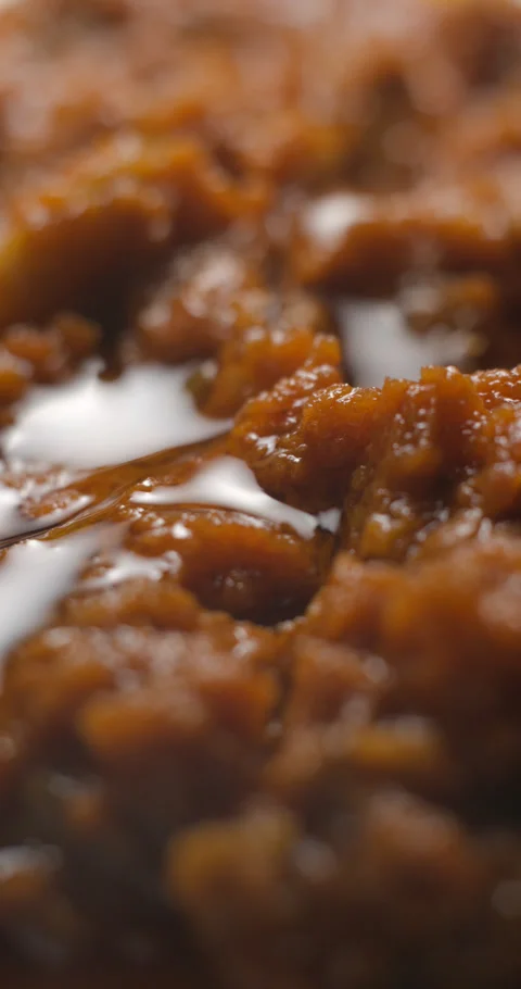 Brushetta tomato preparation rotating with basil pouring slow motion Stock Footage 280519926