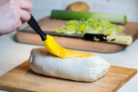 Brushing beef wellington 스톡 사진