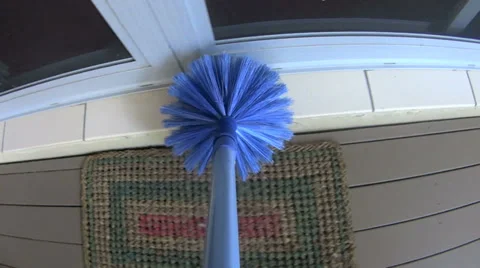 Brushing Cobwebs On Door Sill Stock Footage 36800988