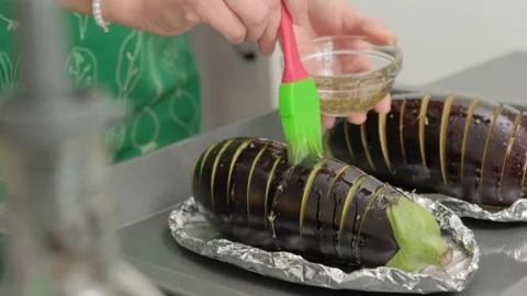 Brushing Eggplant with Marinade in Cooking Kitchen Video stock 341466832