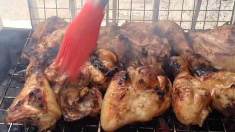Brushing grilled meat Stock Footage 85876412