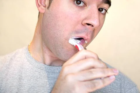Brushing His Teeth Stock Photos