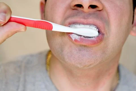 Brushing His Teeth Stock Photos